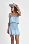 Woman wearing Jacky denim light blue strapless dress from muche et muchette
